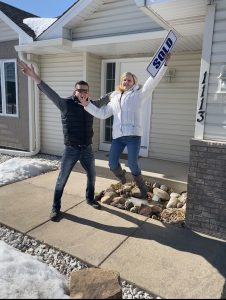 Anoka County home buyers celebrating after purchasing their home with Realtor Steve Varhol